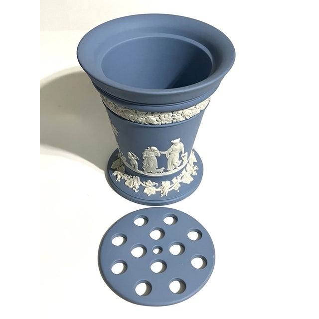 A beautiful example of Wedgwood’s timeless craftsmanship, this classic blue Jasperware vase comes complete with its...