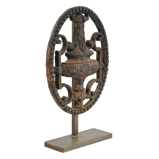 This elegant 19th-century cast-iron balcony ornament, sourced from a historic convent in northern France, is a magnificent...