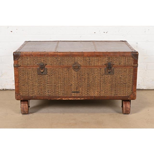 A gorgeous rattan and leather trunk, blanket chest, or coffee table By Baker Furniture, "Milling Road" Collection USA,...