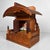 Small wooden shrine with an elegantly arched roof and fine fretwork, crafted in natural wood. Dimensions: heigth 37 cm,...