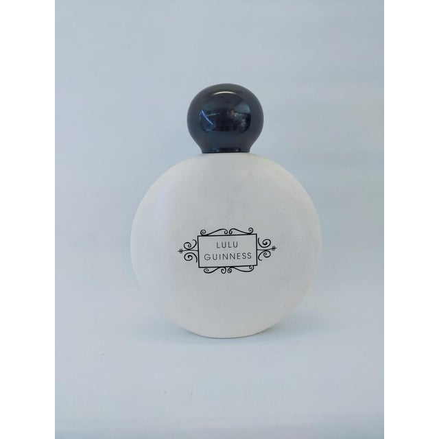 Rare display bottle of lulù guinness perfume in plastic material. It has a beautiful decoration designed by the designer...