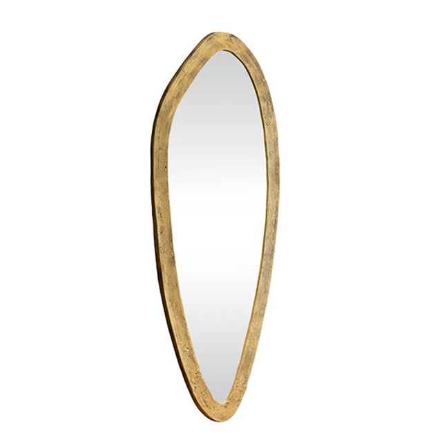 Add a touch of glam to your home with Macy wall mirror, our organic oval shaped mirror in a chic brass finish. A uniquely...