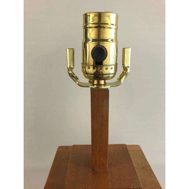 Pair of mid-20th century stacked wooden lamps. Newly wired. One is slightly larger than the other. Larger lamp: 20.5" H x...