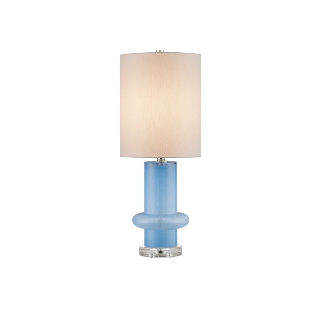 Made of a lively color of turquoise glass, the Aquaviva Table Lamp has a long columnar shape with a perfectly placed bulge...