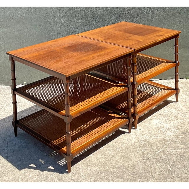 Crafted in richly grained fruitwood or walnut, this mid-century pair of three-tier accent tables balances classic...