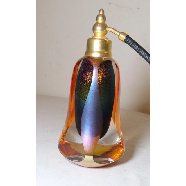 up for sale is a high quality hand blown studio art glass perfume atomizer bottle. It's signed and dated underneath by the...