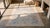 Textile 1920s Soft Blue Ivory Tan Antique Indian Agra Cotton Rug 4'3" X 6' Geometric Carpet For Sale - Image 7 of 9