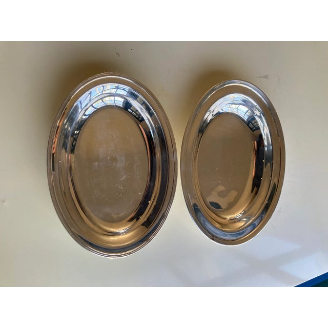 Vintage silver plated covered serving bowl 11.10"L X 8"W without cover 1.5"H , makers mark reads " Meriden s.p.co....