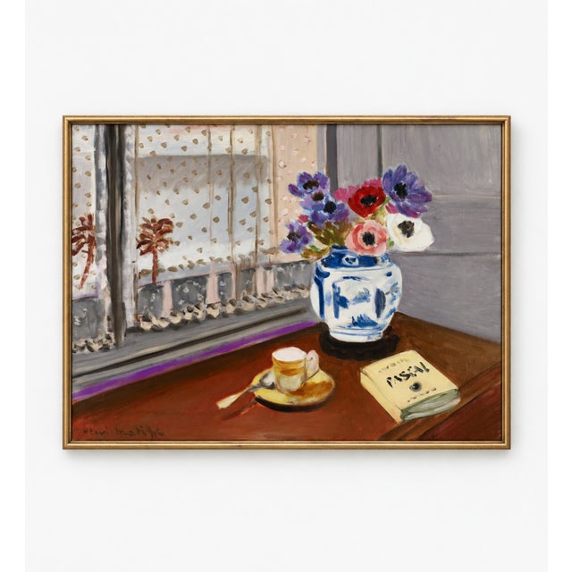 This vintage French still life art print by Henri Matisse depicts a quiet tabletop scene overlooking a palm-lined view....