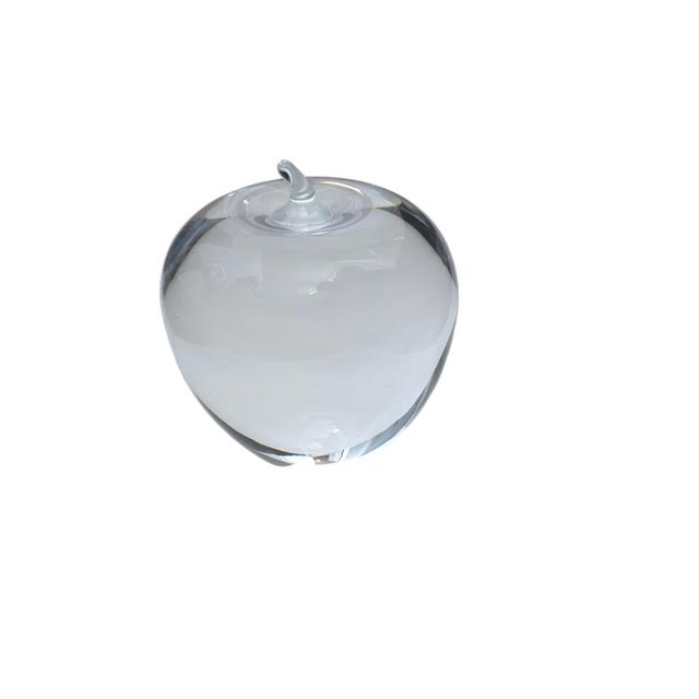 Crafted from fine crystal, this Tiffany & Co apple paperweight adds sophistication to any desk or shelf while serving as a...