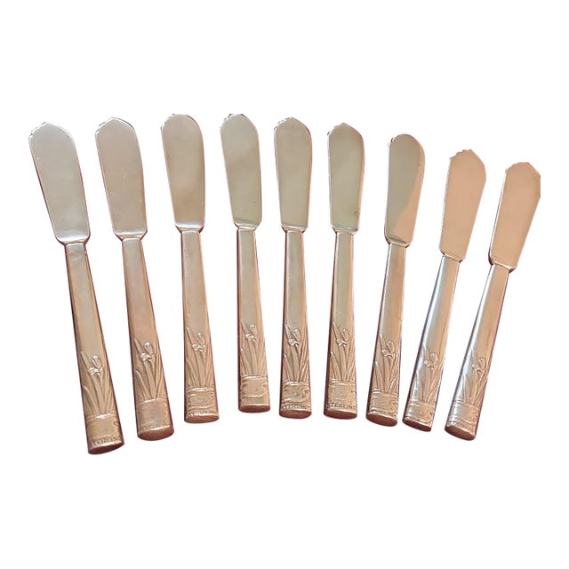 Early 20th Century Art Deco Durgin Iris Sterling Silver Hollow Handle Butter Spreaders - Set of 9 For Sale