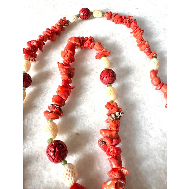 Wonderful vintage coral and Chinese Cinnabar 36" beaded necklace. Add a pop of color to any outfit.