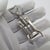 Vintage solid silver miniature figurine depicting a traditional lever corkscrew with moving parts, crafted in Arezzo,...