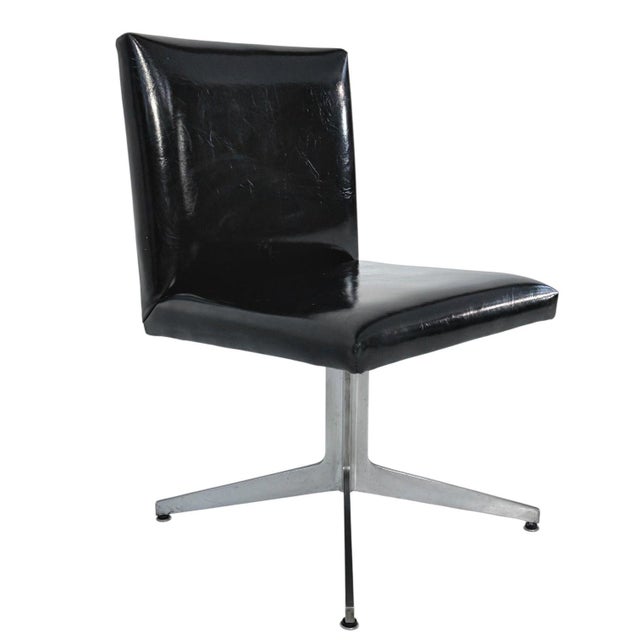 Set of 6 Ward Bennett Black Naugahyde and Aluminum Dining Chairs, 1960. Original condition. Wear consistent with age and...