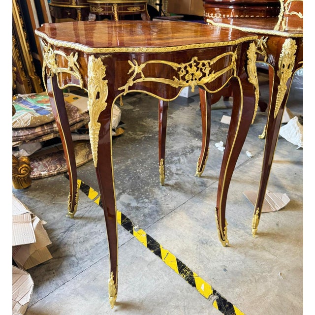 Add elegance and functionality to your space with this charming French-style Louis XVI small side table. Crafted from...