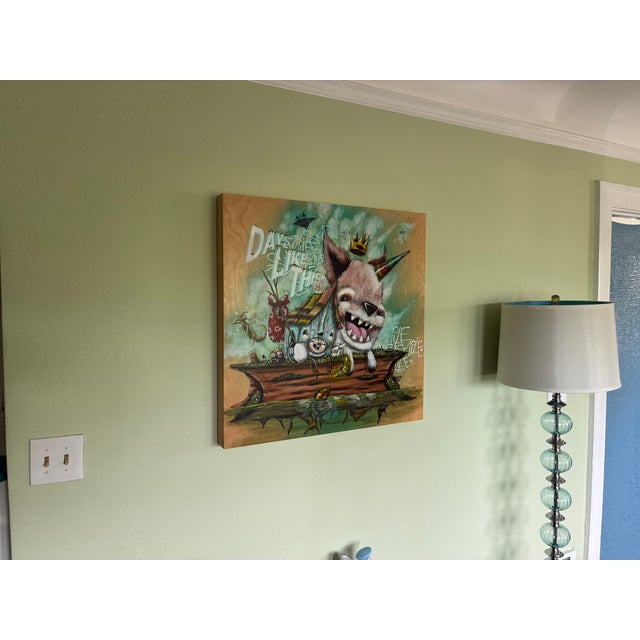 I commissioned this painting by Seattle muralist and painter Carlos Aguilar and his partner Ksra. It’s on cradled wood...