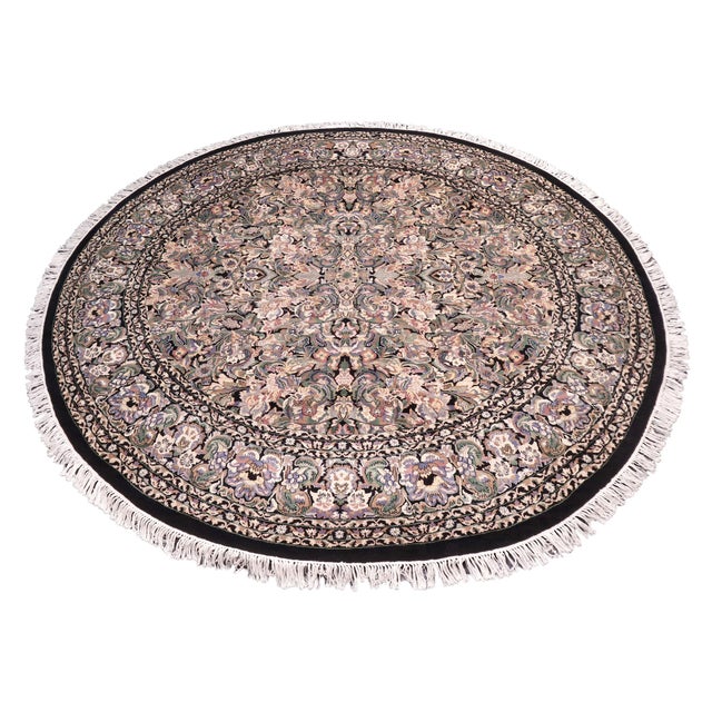 This hand‑knotted Pak Persian round rug showcases the finest expression of traditional Persian artistry. Each piece is...