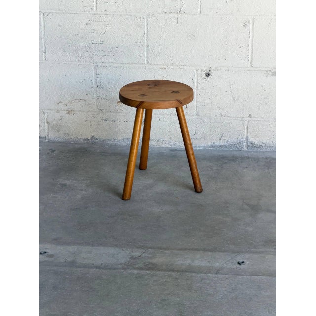 Charming vintage Danish Mid-Century Modern tripod stool crafted in solid wood with a beautifully simple Scandinavian...