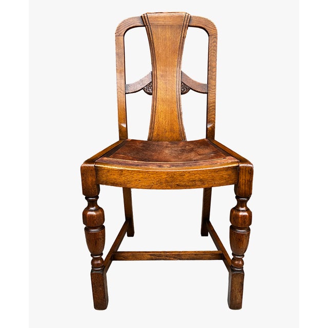 Beautiful vintage English oak dining chairs. Quality craftsmanship and lovely wood grain.