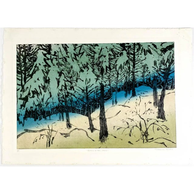 1970s Katharine McCabe (1926-2012) color landscape etching on paper titled "Forest in the Snow." Artist's proof.
