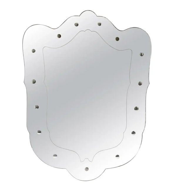 Unique Italian 1940's mirror. Frameless with wood back panel. Measures: 40.95" H x30.32" W x 1.58" D