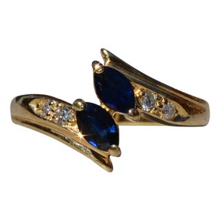 The Norwinden: Ladies 14K Yellow Gold Bypass Style Ring set with Sapphire and Diamonds For Sale