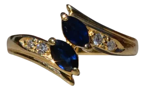 The Norwinden: Ladies 14K Yellow Gold Bypass Style Ring set with Sapphire and Diamonds