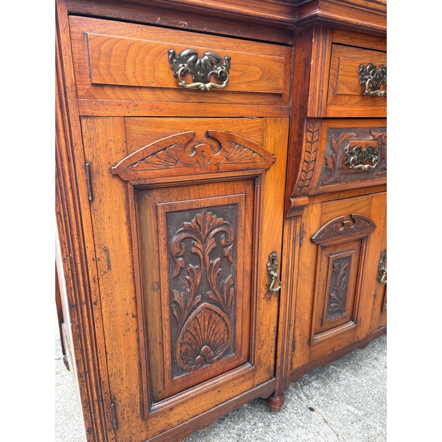 Antique Victorian Walnut Sideboard Featuring Intricate Hand Carvings and Original Ornate Brass Hardware For Sale - Image 12 of 12