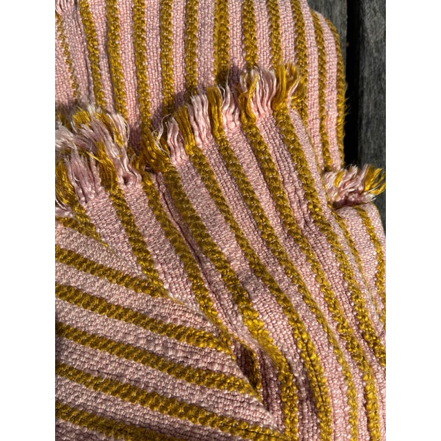 This curtain panel is made from a single width of striped fabric,loosely woven, with a narrow band of self fringe at the...