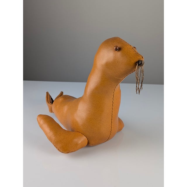 Charming sculpture in the shape of a seal, made of leather with rope details and visible seams, a fantastic decorative...