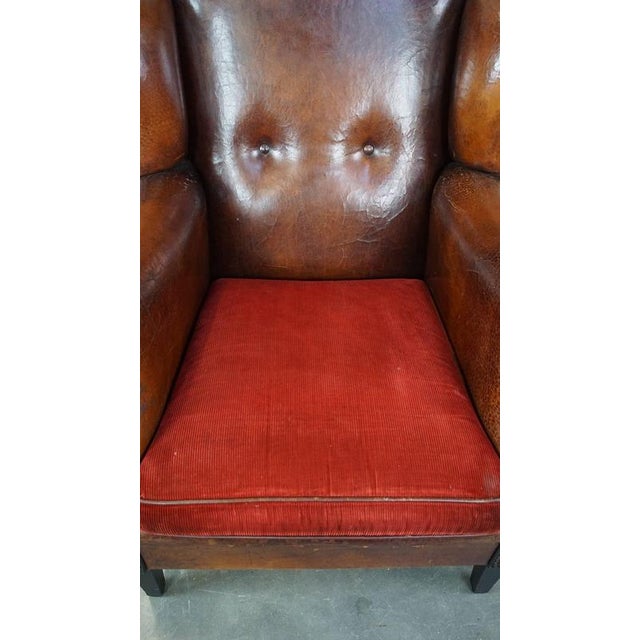 Vintage Leather Wing Chair with Red Corduroy Seat Cushion For Sale - Image 6 of 14