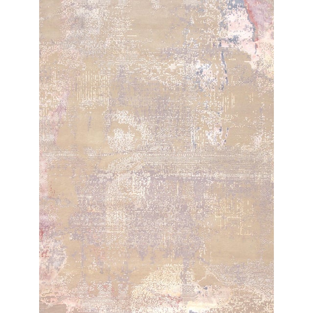 The Modern Collection explores hand-knotted designs through abstract patterning, solid tonal fields, and subtle surface...