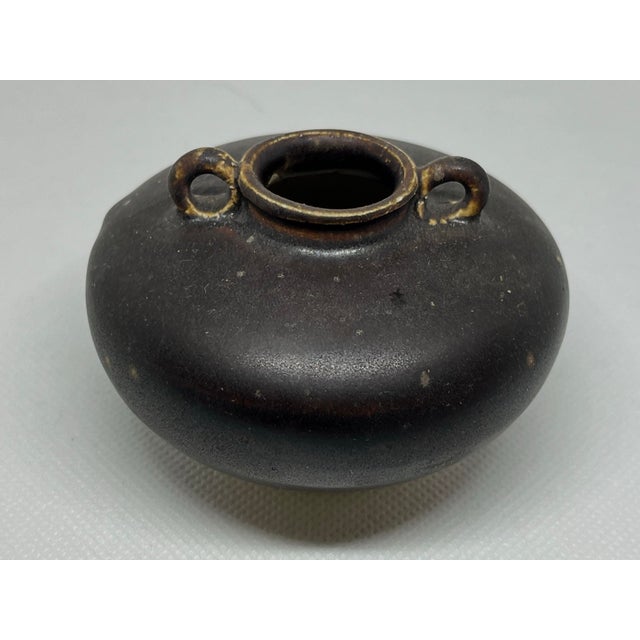 A original antique Chinese Stoneware with brown glaze Vase from the Song Dynasty (960-1279) Measuring approximately wide...