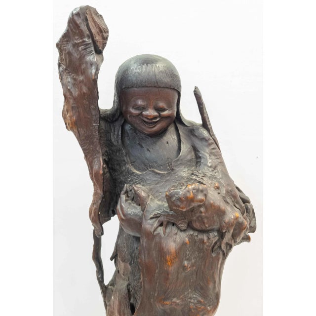 We are offering this great and large Chinese or Japanese carved figure. We believe this figure is probably Chinese and is...