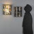 Pair of wall lamps featuring a metal structure supporting an elegant diffuser made with stained glass arranged in a mosaic...