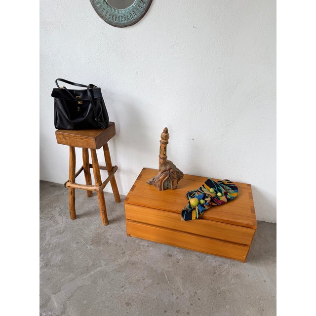 A 1900s folk art or brutalist sculpture carved from a single piece of wood, depicting a church. we love the wood's patina,...