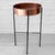 A modernist flower stand produced by the Swedish manufacturer Ystad Metall in the 1950s. The design features a circular...