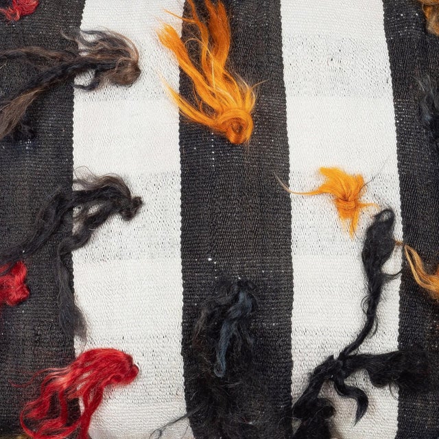 Add a touch of history and warmth to your space with this vintage handmade Turkish wool kilim cushion cover. Crafted from...