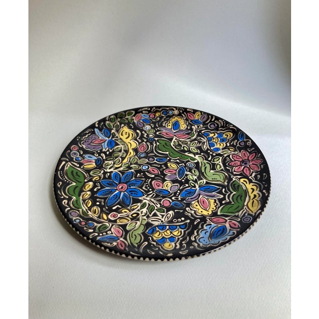 Late 20th Century brightly painted circular Glazed Ceramic Sophia Cake Plate. Featuring a circular form with Black...