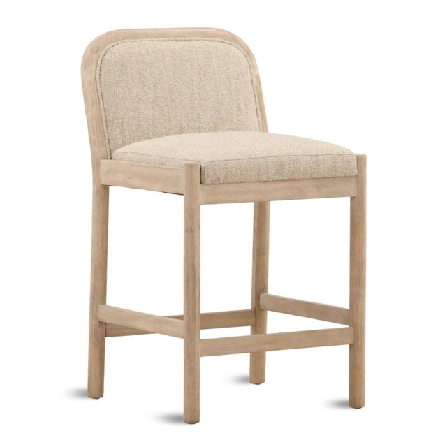 Solid wood counter with a light natural finish and softly rounded frame. Generously cushioned seat and curved back...