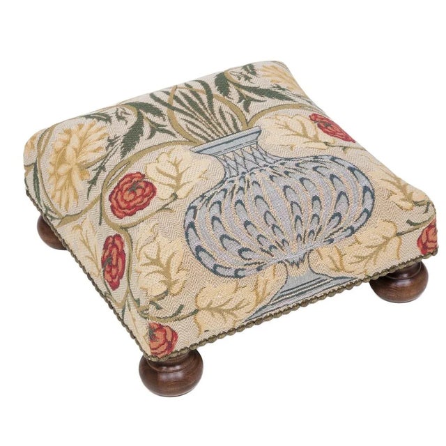 Tapestry Footstools with bun-feet and traditional-style studding.
