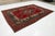 Persian This Vintage Handmade Persian Tabriz Wool Rug in a Rich Red With a Rosette Motif For Sale - Image 3 of 10