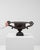 This piece presents as a urn, distinguished by dark bronze/black cast metal, scrolled handles. Dating to 1900s and...