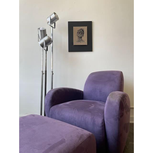 Now available. A sculptural postmodern swivel lounge chair with matching ottoman, attributed to Michael Wolk for...