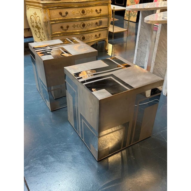 The product is a pair of MCM Paul Evans Chrome and Nickel "City Scape" cubes. The combination of chrome and nickel...