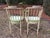 Pair of vintage faux bamboo painted armchairs produced by Baker circa 1960. The original finish shows wear as per the...