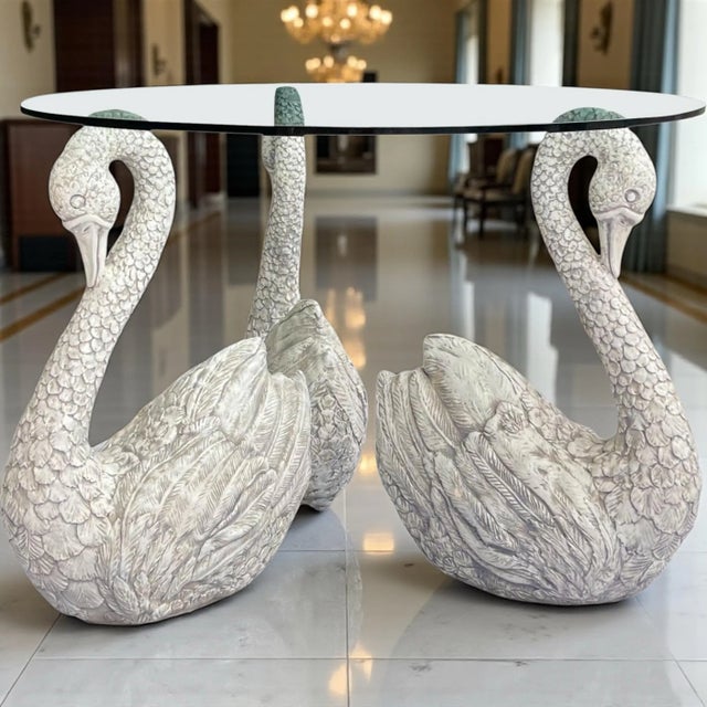 This is wonderful neo-classical style center table. The three large swans are extremely heavy and free standing, so they...