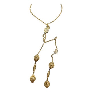MCM Jewelry Victorian Revival Adjustable Lariat Necklace Features a Gold-Tone Twisted Double Rope Chain With Floral-Embossed Sliding Tension Clip. For Sale