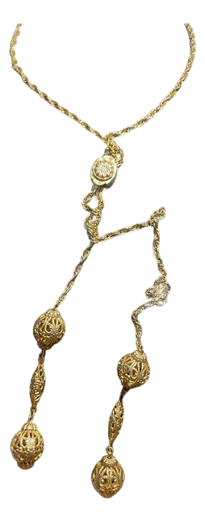 MCM Jewelry Victorian Revival Adjustable Lariat Necklace Features a Gold-Tone Twisted Double Rope Chain With Floral-Embossed Sliding Tension Clip.