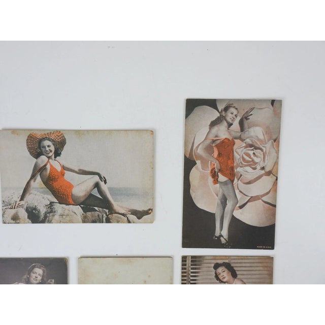 Set of 5 vintage 1940's photographs pinups of women printed on cardboard arcade cards. Likely published by Exhibit Supply...